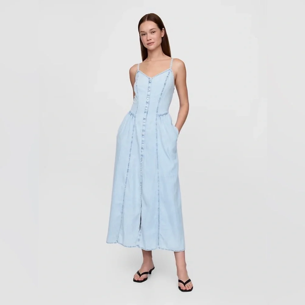 gap denim maxi dress Drop-Waist Adjustable tank straps with interior button closures at back Denim Maxi Dress | Gap